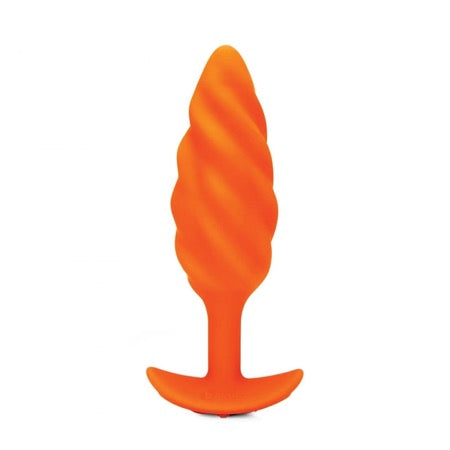 An orange-colored, silicone anal plug with a swirl texture design and a tapered base.