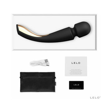 The image shows the LELO Smart Wand 2 in black, along with a white cord, a black carrying case, and a business card with the LELO logo.