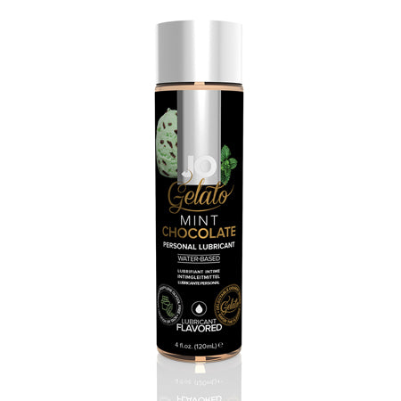 A bottle of JO Gelato Mint Chocolate Flavored Water-Based Lubricant, 4 oz size, with a black and rose gold design.