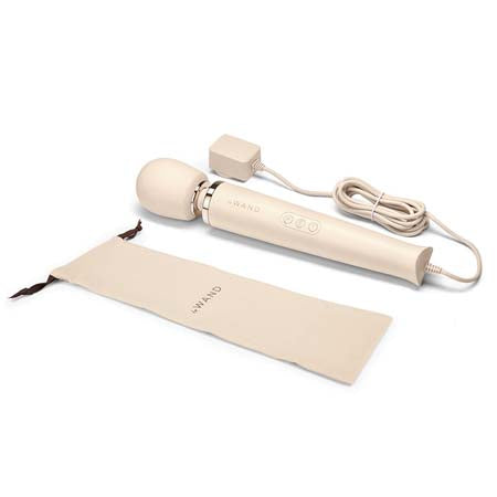 A beige Le Wand Plug-In Vibrating Massager with a sleek, ergonomic design. The product includes a control panel and an 8-foot power cord.