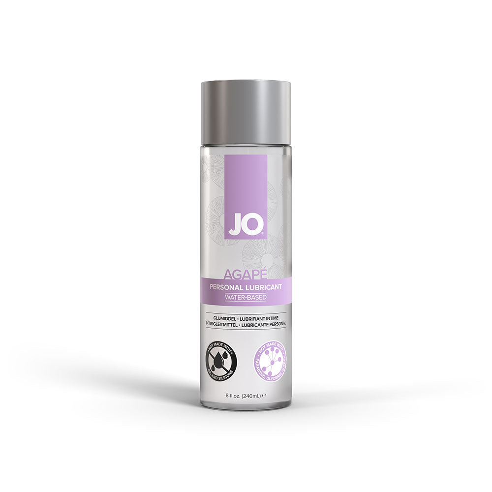 Bottle of JO Agape Water-Based Lubricant with a purple label, clear liquid visible inside the bottle, designed for sensitive skin.